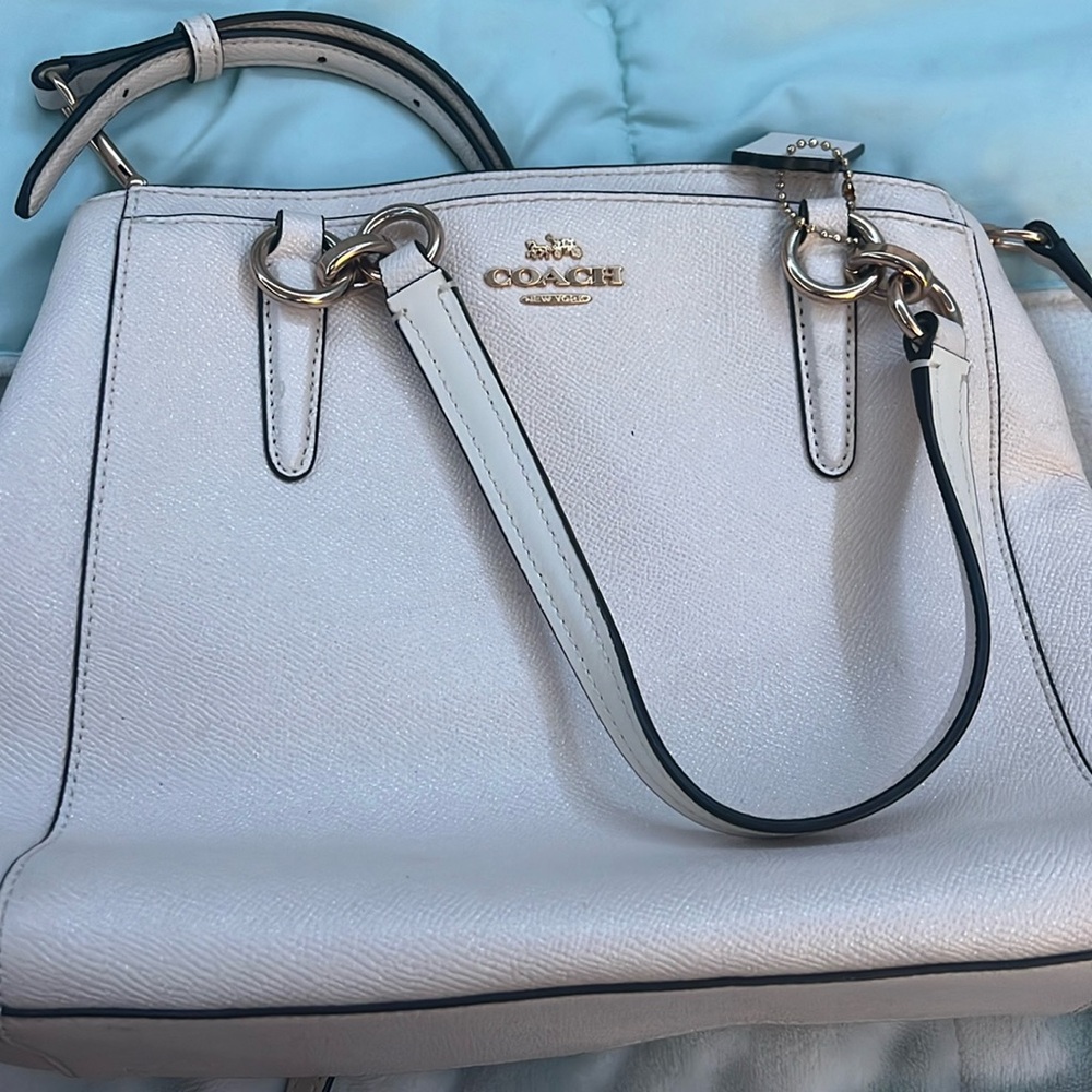 Cute coach cross body or just bag goes with a lot